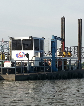 A VMI Gladiator 1230 portable cutter suction dredge at work in St. Louis, Missouri.