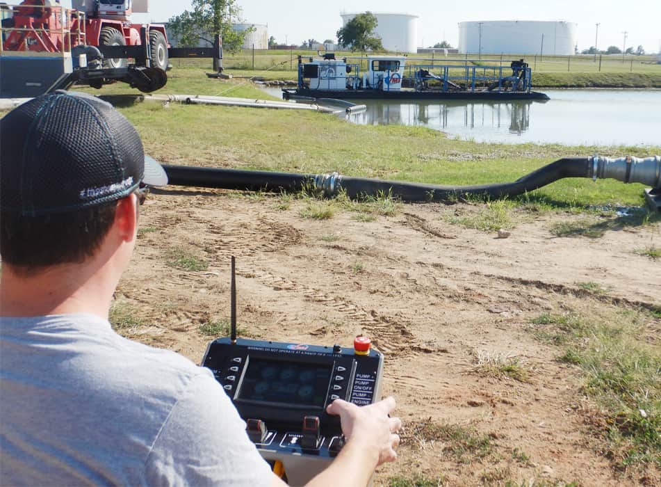 VMI Design Engineer, Robbie Daughtery testing the romote conrolled dredge at VMI Dredges Headquarters