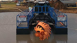 VMI Dredge Titan heading out to jobsite