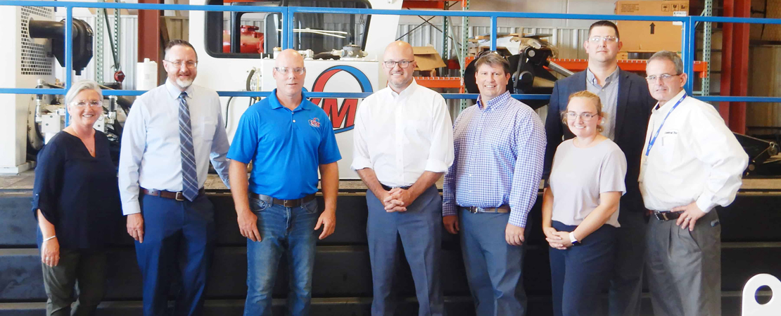 Cash Maitlen, President, VMI, Inc. with members of tour group