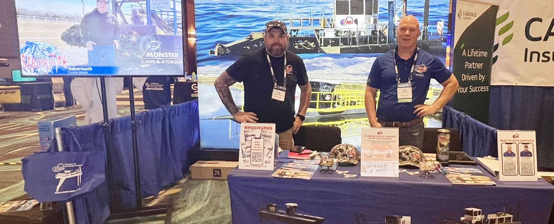 Cash Maitlen, VMI Dredges President and  Pat Sumpter, VMI Dredges Sales Manager at the VMI Dredges booth at WEDA 2023 Conference in Las Vegas, Nevada