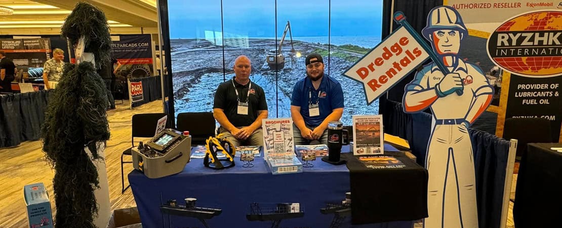 Cash Maitlen, President VMI Dredges and Joe McAllister, VMI shop foreman at the VMI Dredges booth WEDA 2024 Tampa Florida